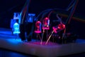 Breadboard arduino nano prototyping board transistors resistors LEDs red and blue in glow in the dark on black skin