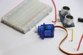 Breadboard with micro servo and ultrasonic sensor module for development board projects Royalty Free Stock Photo