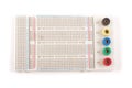 Empty breadboard for electronics prototyping on the whi