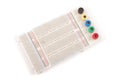 Empty breadboard for electronics prototyping isolated on the white background