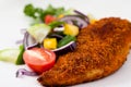 Breaded chicken breast with vegetables Royalty Free Stock Photo