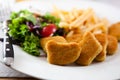 Breaded chicken with french fries Royalty Free Stock Photo