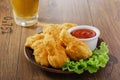 Breaded chicken wings with ketchup Royalty Free Stock Photo