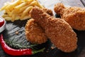 Breaded crispy chicken leg fried french fries sauce