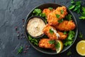Breaded and fried fish fingers served with remoulade sauce and lemon Royalty Free Stock Photo