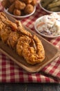 Breaded and Fried Jumbo Shrimp with Tails on a Wooden Table Royalty Free Stock Photo