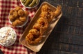 Breaded and Fried Jumbo Shrimp with Tails on a Wooden Table Royalty Free Stock Photo