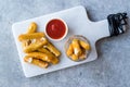 Breaded Fried Mozzarella Cheese Sticks with Ketchup Dipping Sauce Royalty Free Stock Photo