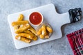 Breaded Fried Mozzarella Cheese Sticks with Ketchup Dipping Sauce Royalty Free Stock Photo