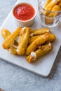 Breaded Fried Mozzarella Cheese Sticks with Ketchup Dipping Sauce Royalty Free Stock Photo