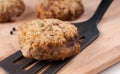 Breaded fried patty on spatula