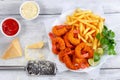 Breaded Fried Shrimps with french fries Royalty Free Stock Photo