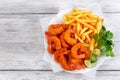 Breaded Fried Shrimps with french fries Royalty Free Stock Photo