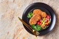 Breaded lamb chops served on a plate Royalty Free Stock Photo