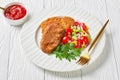 Breaded lamb chops served on a plate Royalty Free Stock Photo