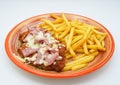 Breaded milanese with ham and cheese South American style with French fries Royalty Free Stock Photo