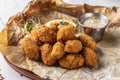 Breaded mussels, lemon and sauce, beer snack, horizontal photo