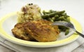 Breaded pork chop with beans Royalty Free Stock Photo