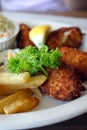 Breaded scampi tails with salad leaves