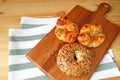 Breads with Pumpkin Seeds, Sunflower Seeds and Sesame in Different Types on Wooden Tray Served on the Table Royalty Free Stock Photo