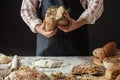 Chef Breaking Freshly Baked Sourdough Bread