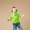 break dance kids. little break dancer showing his skills in dance studio. Hip hop dancer boy performing over studio background Royalty Free Stock Photo