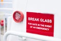 Break glass emergency red sign container white background Royalty Free Stock Photo