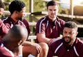 Break, rugby and team of sports men talking, relax and share ideas for training at a field. Fitness, friends and man Royalty Free Stock Photo