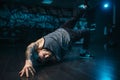 Breakdance motions, performer in dance studio Royalty Free Stock Photo