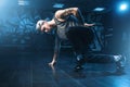 Breakdance motions, performer in dance studio Royalty Free Stock Photo