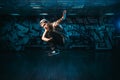 Breakdance motions, performer in dance studio Royalty Free Stock Photo