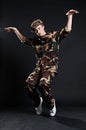 Breakdancer in military uniform Royalty Free Stock Photo