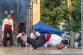 Breakdancers dressed with traditional bulgarian clothes Royalty Free Stock Photo