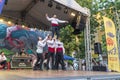 Breakdancers dressed with traditional bulgarian clothes Royalty Free Stock Photo