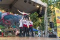 Breakdancers dressed with traditional bulgarian clothes Royalty Free Stock Photo