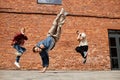 Breakdancing Crew doing Stunts Royalty Free Stock Photo