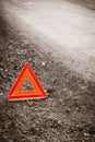 Breakdown of car. Red warning triangle sign on road Royalty Free Stock Photo