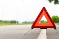 Breakdown triangle stands alongside the road. Car broke down sign on road concept Royalty Free Stock Photo
