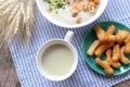 Breakfase meal. Congee or Rice porridge minced pork, boiled egg with soy milk and Chinese deep fried double dough stick