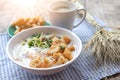 Breakfase meal. Congee or Rice porridge minced pork, boiled egg with soy milk and Chinese deep fried double dough stick