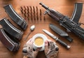 Breakfast of an arny soldier or terrorist. Hands in military gloves holds a coup of coffee.