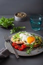 Breakfast avocado sandwich with fried egg and tomato Royalty Free Stock Photo