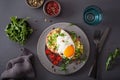 Breakfast avocado sandwich with fried egg and tomato Royalty Free Stock Photo