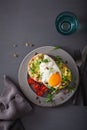 Breakfast avocado sandwich with fried egg and tomato Royalty Free Stock Photo