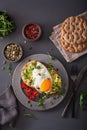 Breakfast avocado sandwich with fried egg and tomato Royalty Free Stock Photo