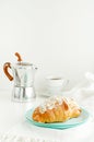 Breakfast background. Fresh croissants and coffee on white table. Vertical Royalty Free Stock Photo