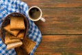 Breakfast background, toast and coffee on rustic wood, top view Royalty Free Stock Photo