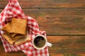 Breakfast background, toast and coffee on rustic wood, top view Royalty Free Stock Photo