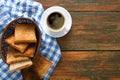 Breakfast background, toast and coffee on rustic wood, top view Royalty Free Stock Photo