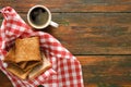 Breakfast background, toast and coffee on rustic wood, top view Royalty Free Stock Photo
